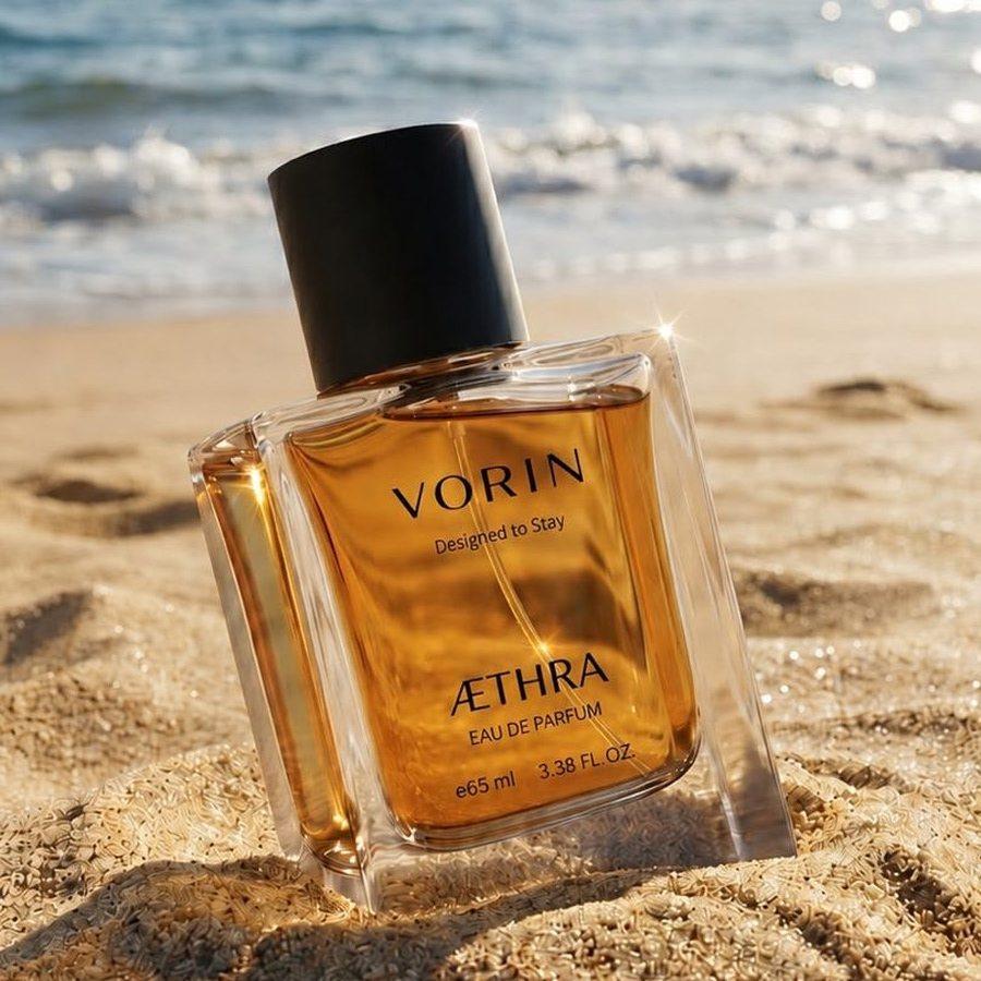 AETHRA bottle resting on a beach